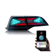 Tesla model 3/Y 18-23 RGB tail lights showcasing vibrant color options with smartphone control.